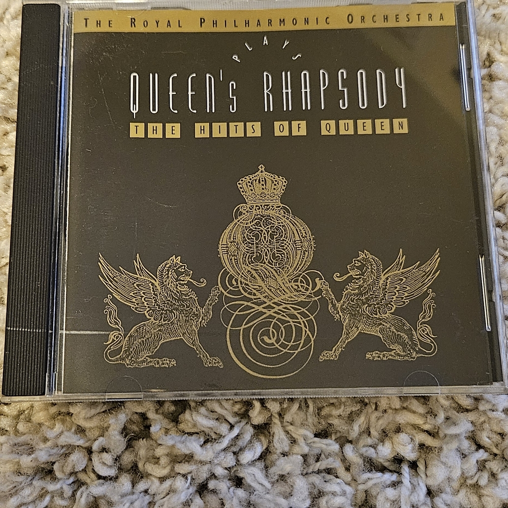 Queen's Rhapsody CD by The Royal Philharmonic Orchestra.    #078